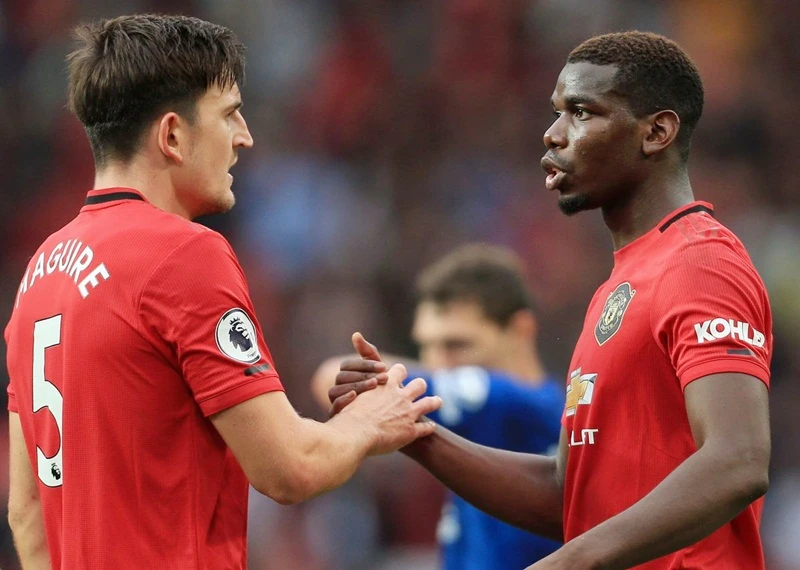 Trung vệ Harry Maguire (trái) và tiền vệ Paul Pogba đều là người đắt giá nhất trong vị trí của mình. Ảnh: Getty Images 