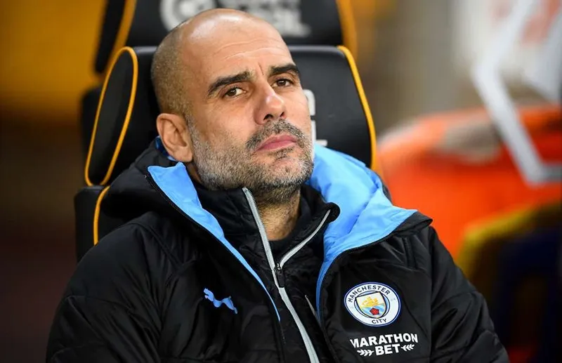 HLV Pep Guardiola thất vọng trên băng ghế chỉ đạo. Ảnh: Getty Images
