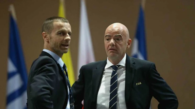 Chủ tịch FIFA, Gianni Infantino (phải) và Chủ tịch UEFA, Aleksander Ceferin. Ảnh: Getty Images 