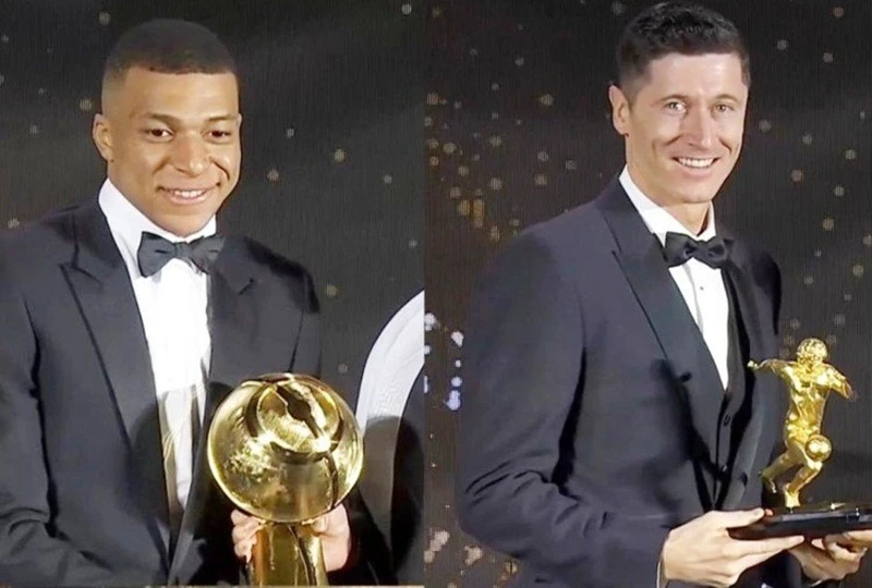 Robert Lewandowski (phải) và Kylian Mbappe công khai phản đối World Cup hai năm một lần.