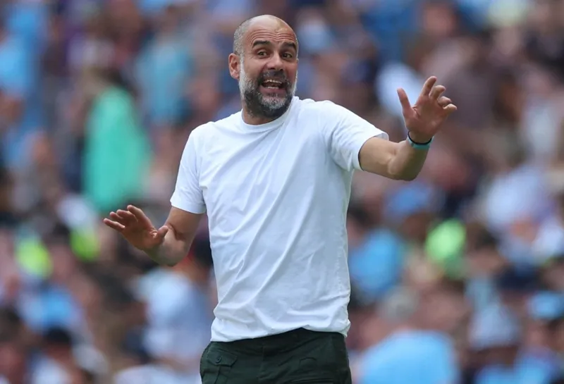 HLV Pep Guardiola muốn Man.City tiến từng bước vững chắc. Ảnh: Getty Images