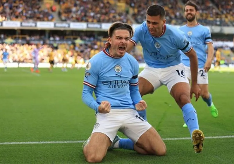 Jack Grealish phấn khích tột độ khi ghi bàn thắng đầu tiên của mùa giải. Ảnh: Getty Images