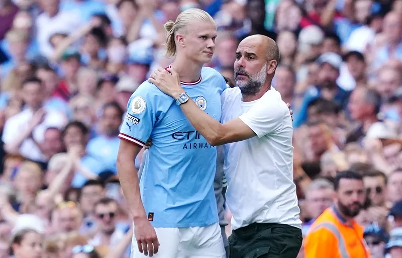 Erling Haaland không thể hạnh phúc hơn khi được một HLV như Pep Guardiola xem như “báu vật”. Ảnh: Getty Images