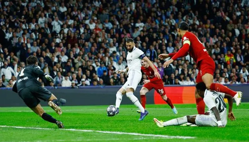 Karim Benzema ghi bàn từ cự ly gần sau đường chuyền của Vinicius Junior ở phút 78. Karim Benzema ghi bàn từ cự ly gần sau đường chuyền của Vinicius Junior ở phút 78.