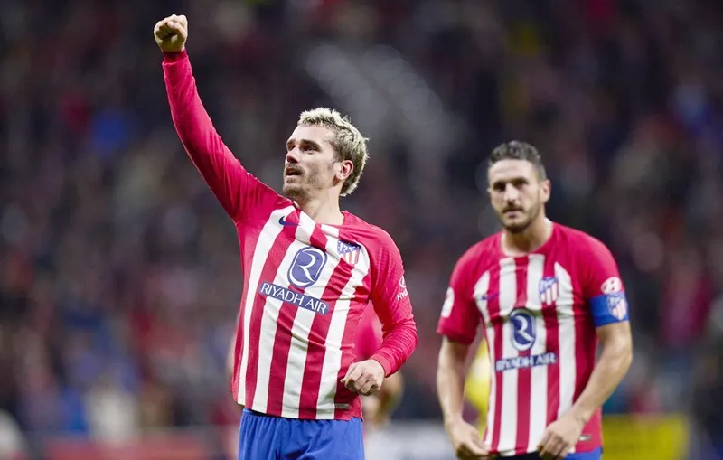 Antoine Griezman lại ghi bàn giúp Atletico Madrid đánh bại Villarreal 3-1. Antoine Griezman lại ghi bàn giúp Atletico Madrid đánh bại Villarreal 3-1.