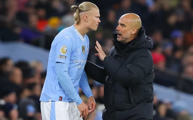 HLV Pep Guardiola bác bỏ tin Erling Haaland không hài lòng ở Anh và muốn đến Real Madrid.