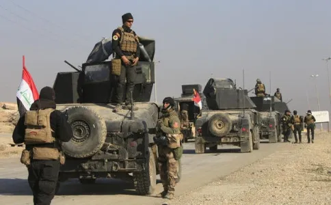 Binh sĩ Iraq tiến vào Mosul. Ảnh: REUTERS