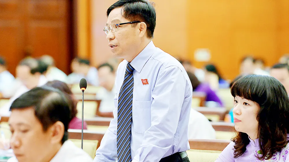 Ông Lê Nguyễn Minh Quang là trường hợp người ngoài Đảng được lãnh đạo TPHCM tin tưởng giao trọng trách Trưởng ban Quản lý đường sắt đô thị TP Ảnh: VIỆT DŨNG