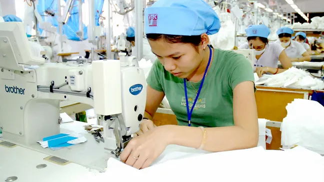 May xuất khẩu tại Công ty may Việt Tiến Ảnh: CAO THĂNG
