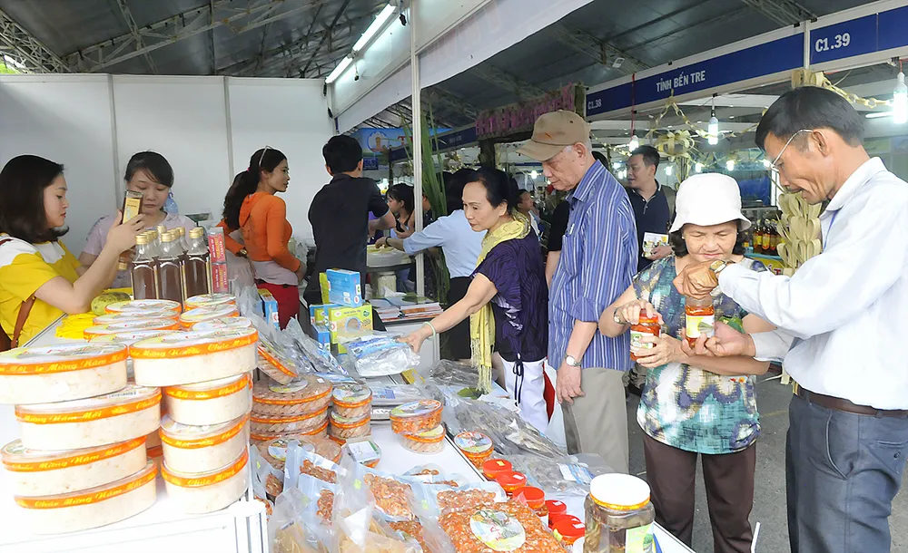 Ký kết hơn 500 hợp đồng cung ứng và tiêu thụ sản phẩm ảnh 1 Ký kết hơn 500 hợp đồng cung ứng và tiêu thụ sản phẩm ảnh 1
