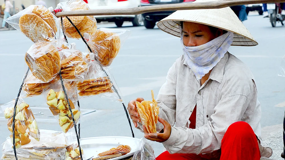 Quy mô người nghèo ở TPHCM không thay đổi nhiều, trong khi khoảng cách giàu nghèo gia tăng Ảnh: VIỆT DŨNG