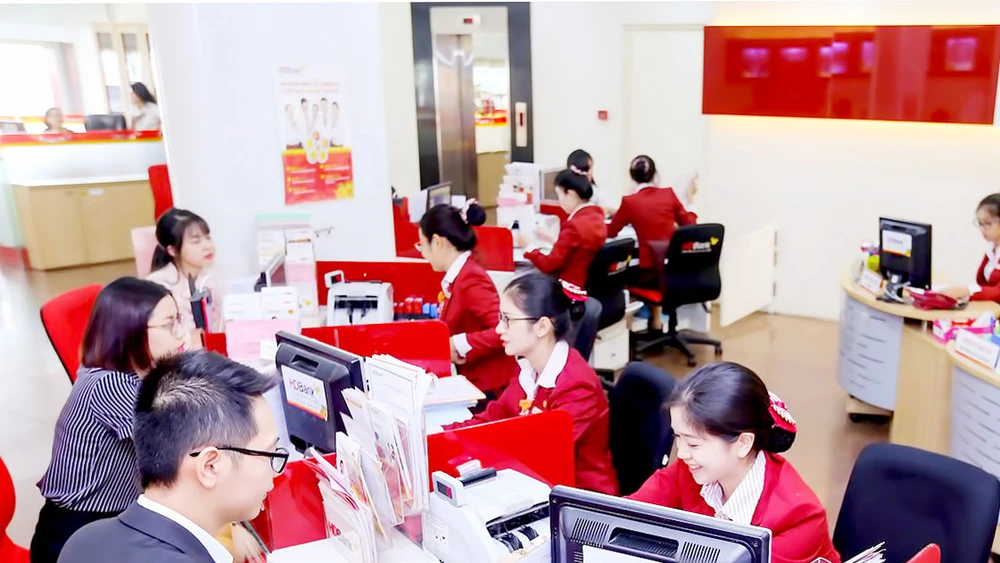 Hiện HDBank đang triển khai các thủ tục để nhận sáp nhập PGBank Ảnh: HUY ANH