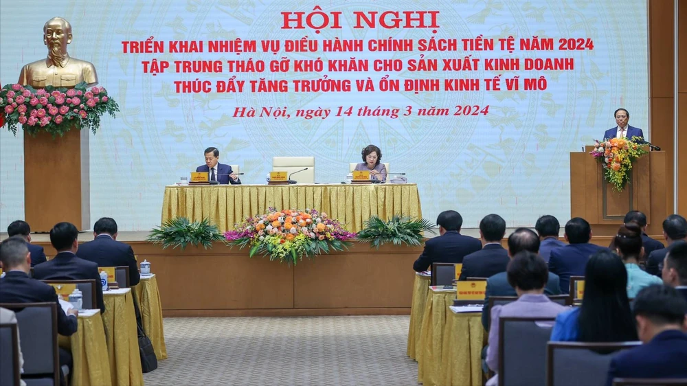 Thủ tướng chủ trì hội nghị về chính sách tiền tệ, tháo gỡ khó khăn cho sản xuất, kinh doanh. Ảnh: VIẾT CHUNG