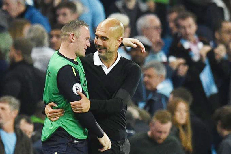 Rooney (trái) và Pep.