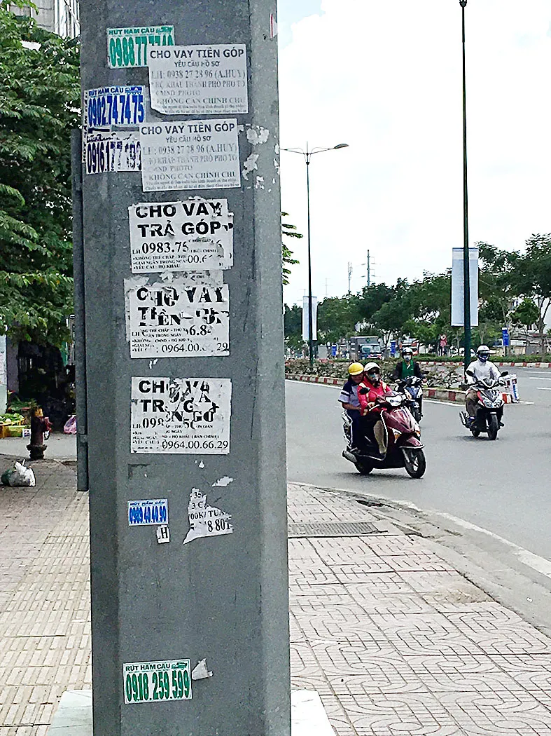 Quảng cáo trái phép bôi bẩn thành phố ảnh 4