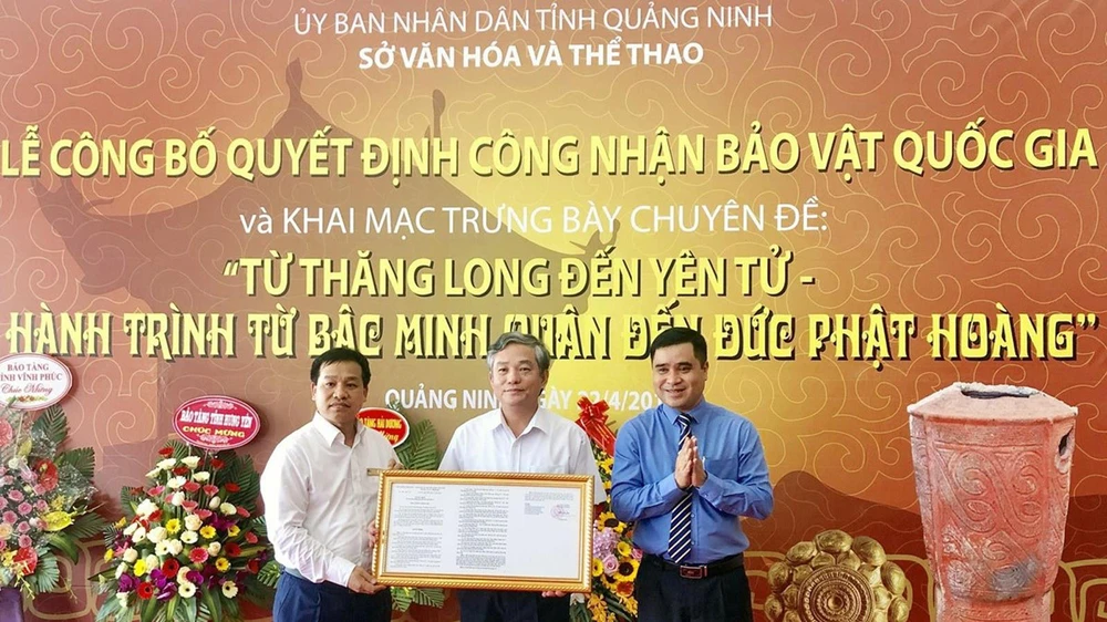 Lễ công bố quyết định công nhận bảo vật Quốc gia. Ảnh: TTXVN