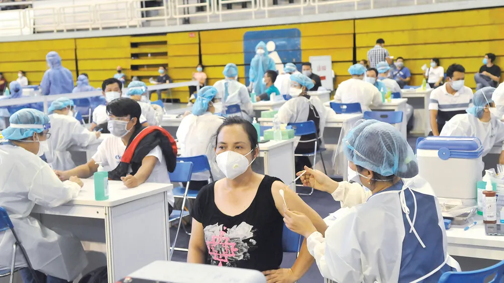 Đẩy nhanh tiến độ tiêm vaccine ảnh 1