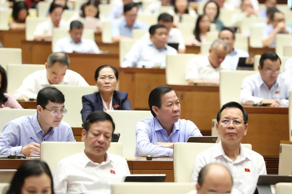 Các đại biểu dự phiên họp sáng 8-6. Ảnh: QUANG PHÚC Các đại biểu dự phiên họp sáng 8-6. Ảnh: QUANG PHÚC