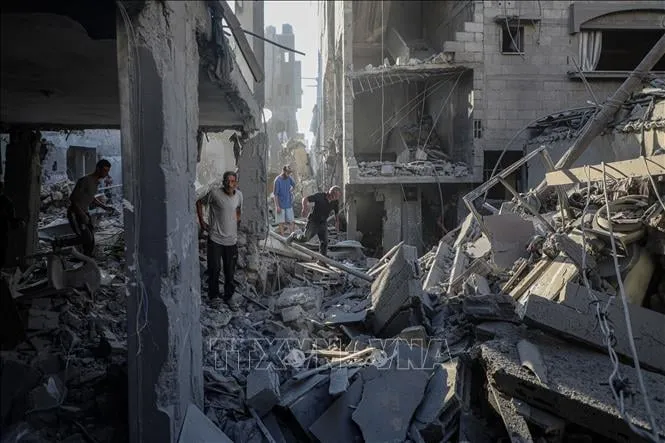 Tòa nhà bị phá hủy sau cuộc không kích của Israel tại Gaza. Ảnh: THX/TTXVN 1.jpeg