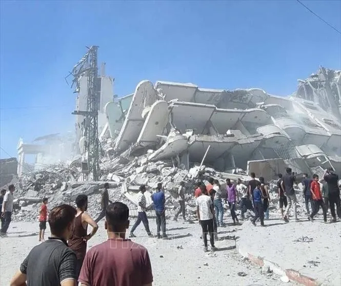 Tòa nhà bị phá hủy sau cuộc không kích của Israel xuống Dải Gaza. Ảnh: IRNA