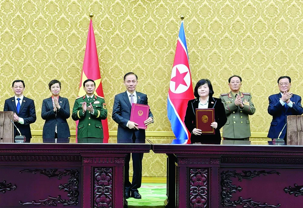 Lễ ký Ý định thư hợp tác giữa Bộ Ngoại giao Việt Nam và Bộ Ngoại giao Triều Tiên K8d.jpg