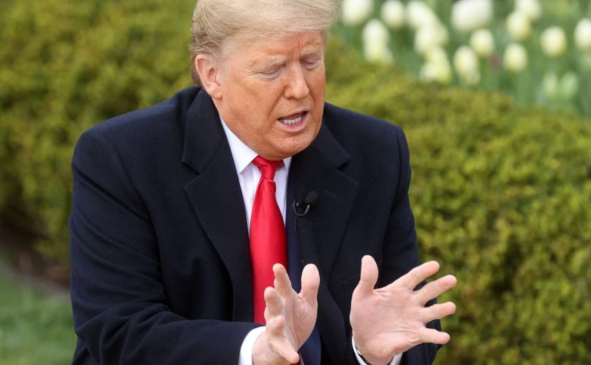 U.S. President Donald Trump speaks during a Fox News "virtual town hall" event on the coronavirus in the Rose Garden of the White House on March 24. © Reuters