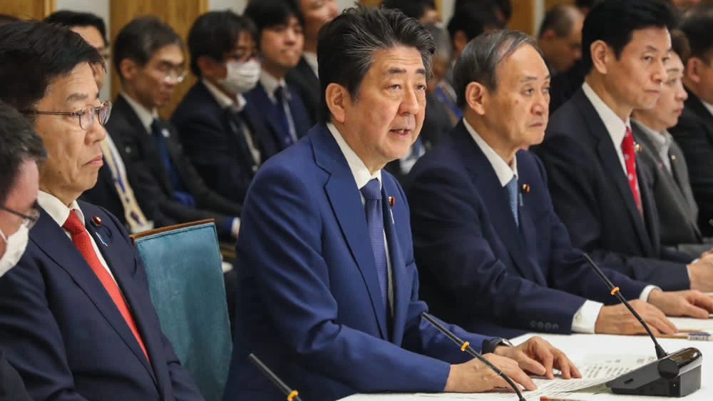 Japanese Prime Minister Shinzo Abe speaks at a government coronavirus task force meeting in Tokyo on Thursday. (Photo by Uichiro Kasai) 