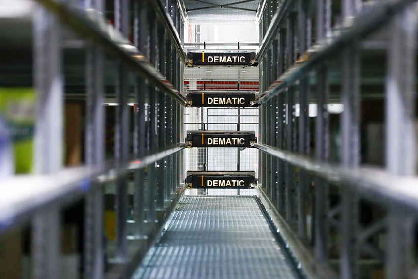 Kion Group, which builds warehouse equipment, is still producing at its German factories. Above, storage racks last year in the Dematic Corp. warehouse, operated by Kion. PHOTO: ALEX KRAUS/BLOOMBERG NEWS