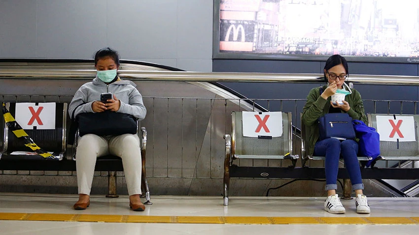 Benches at a station in Jakarta have been marked off to encourage social distancing. © Reuters