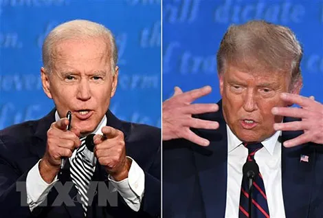 Ứng viên Tổng thống Joe Biden và Tổng thống Mỹ Donald Trump tại cuộc tranh luận trực tiếp đầu tiên ở Cleveland, bang Ohio, Mỹ, ngày 29-9. Ảnh: AFP. Ứng viên Tổng thống Joe Biden và Tổng thống Mỹ Donald Trump tại cuộc tranh luận trực tiếp đầu tiên ở Cleveland, bang Ohio, Mỹ, ngày 29-9. Ảnh: AFP.