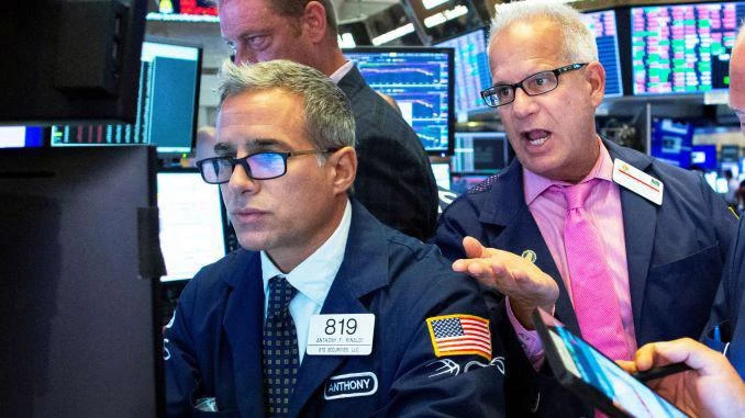 Dow Jones giảm nhẹ trước những đánh giá của Fed; Dầu tiếp tục đà giảm giá