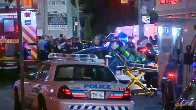 Cảnh sát phong tỏa hiện trường vụ nổ súng ở quận Greektown, TP Toronto, Canada, ngày 22-7-2018. REUTERS