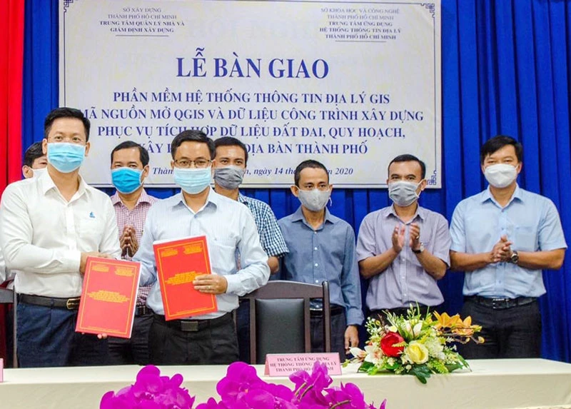 Quang cảnh công bố Phần mềm hệ thống thông tin địa lý GIS mã nguồn mở phục vụ quản lý dữ liệu công trình xây dựng. Ảnh: VIỆT DŨNG