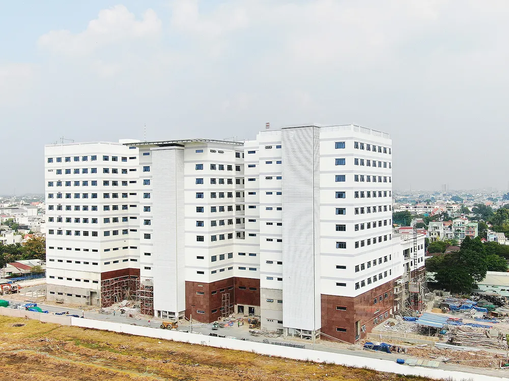 Dự án xây mới Bệnh viện Đa khoa khu vực Hóc Môn đang dần hoàn thiện các hạng mục. Ảnh: HOÀNG HÙNG Dự án xây mới Bệnh viện Đa khoa khu vực Hóc Môn đang dần hoàn thiện các hạng mục. Ảnh: HOÀNG HÙNG