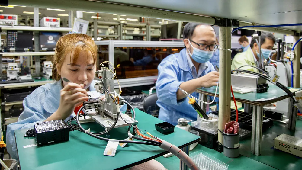 Dây chuyền sản xuất thiết bị điện tử tại Công ty TNHH Datalogic Việt Nam (Khu Công nghệ cao TPHCM). Ảnh: HOÀNG HÙNG