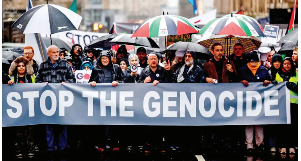 Người biểu tình tại TP Glasgow, Scotland (Anh) mang theo băng rôn có nội dung “chấm dứt sự diệt chủng” kêu gọi ngừng bắn Người biểu tình tại TP Glasgow, Scotland (Anh) mang theo băng rôn có nội dung “chấm dứt sự diệt chủng” kêu gọi ngừng bắn