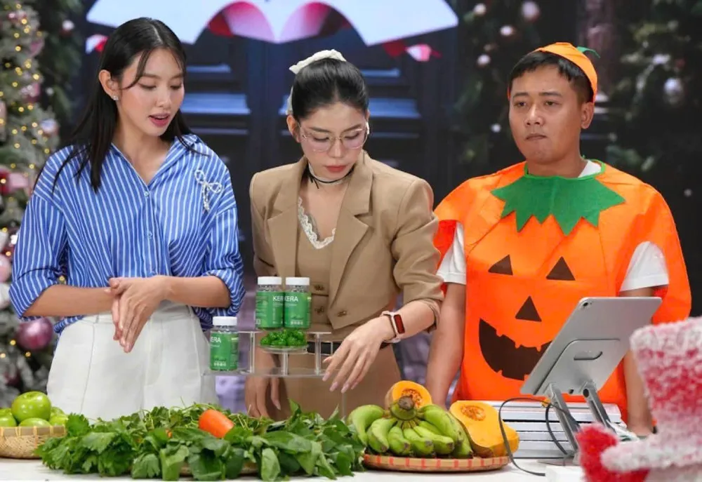 Thùy Tiên - Hằng Du Mục - Quang Linh Vlogs quảng cáo sai sự thật về sản phẩm kẹo rau củ kera. Ảnh: INTERNET thuytien.jpg