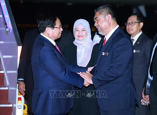 Lễ đón Thủ tướng Phạm Minh Chính tại sân bay quốc tế Kuala Lumpur. Ảnh: Dương Giang/TTXVN thutuong_phamminhchinh1.jpg