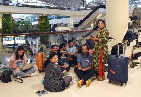 Tourists on Bali Island are stranded at an airport in Denpasar on Monday as their return flights were canceled following a volcanic eruption on the island. — KYODO/VNA Photo