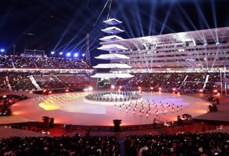 A tower is illuminated at the Pyeongchang Olympic Stadium during the closing ceremony of the Winter Olympics in South Korea on Sunday. — Kyodo Photo