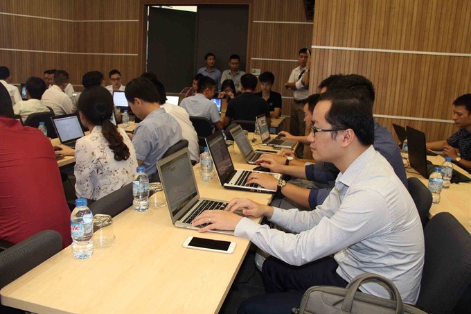 Contestants join a rehearsal on cyber security resolution held by the Vietnam Computer Emergency Response Team in Hà Nội. Việt Nam will conduct a project on cyber security supervision following approval from Prime Minister Nguyễn Xuân Phúc. — VNA/VNS Phot