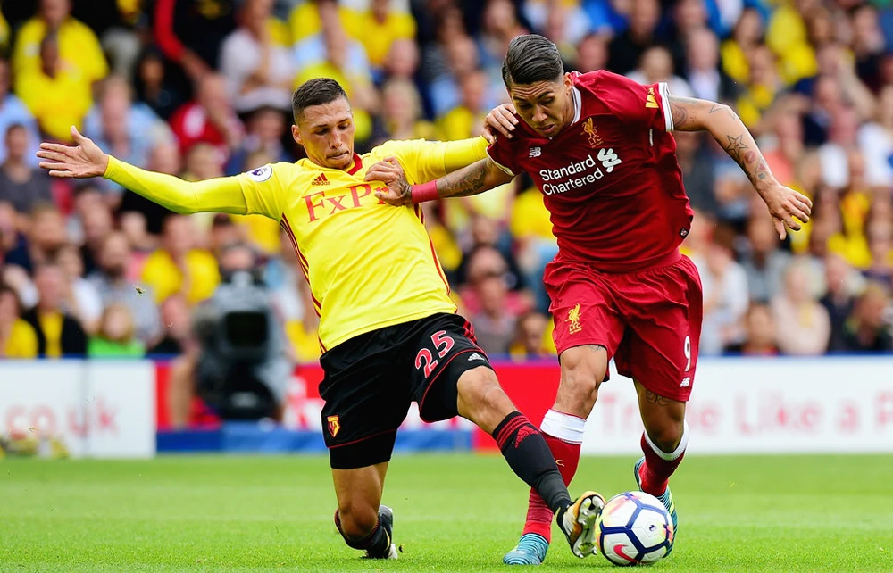 Liverpool (phải) sẽ có chuyến làm khách không hề dễ dàng trước Hoffenhieim