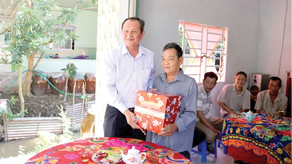 Xổ số kiến thiết Đồng Tháp kết hợp Xổ số kiến thiết Bình Thuận trao nhà tình thương ảnh 1