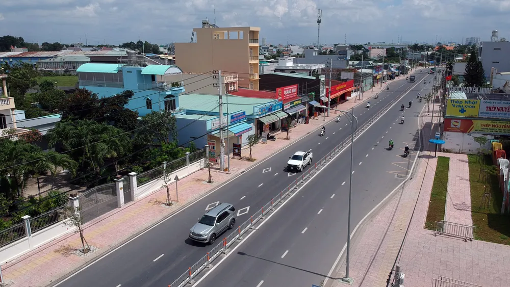 Đường Tô Ký, huyện Hóc Môn đã được nâng cấp, mở rộng. Ảnh: CAO THĂNG