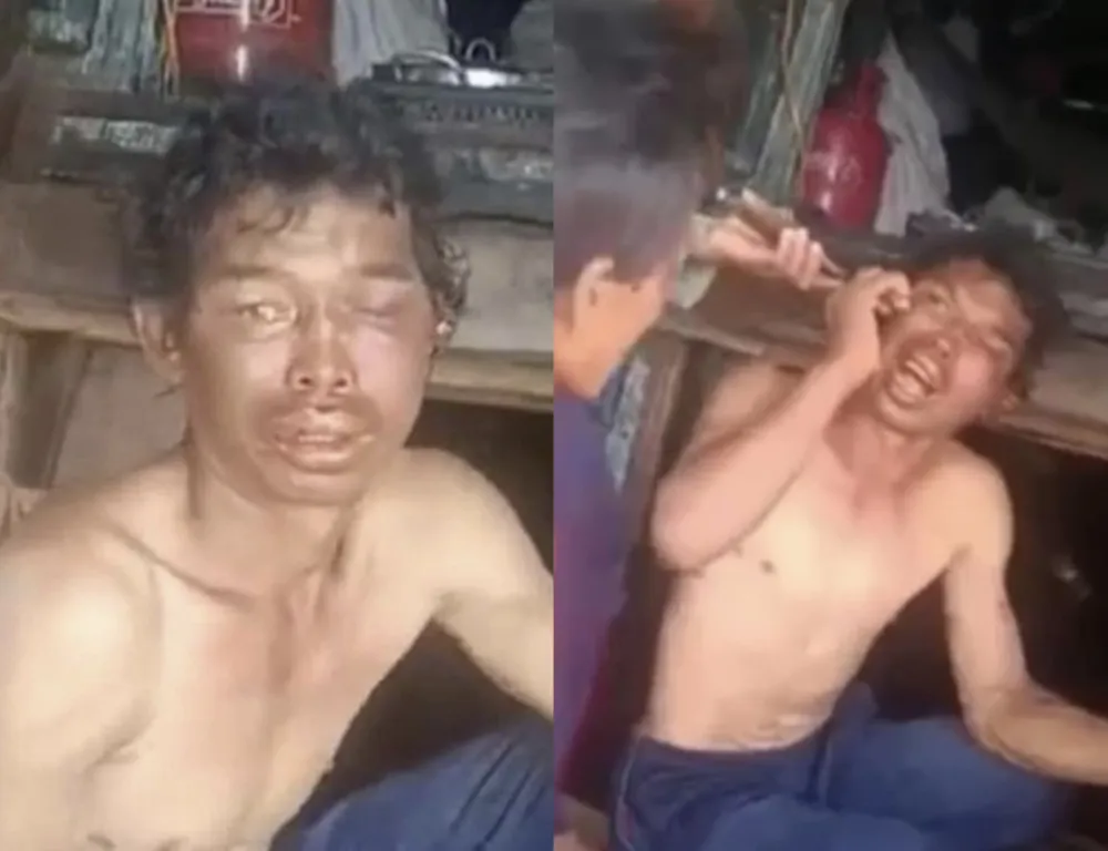 Một trong hai ngư dân bị hành hạ trên tàu cá. Ảnh: Cắt từ clip Một trong hai ngư dân bị hành hạ trên tàu cá. Ảnh: Cắt từ clip