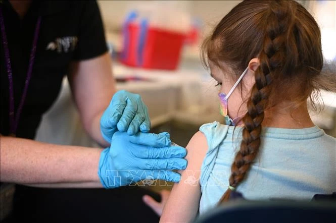  Một điểm tiêm vaccine ngừa Covid-19 tại Los Angeles, Mỹ. Ảnh: AFP/TTXVN