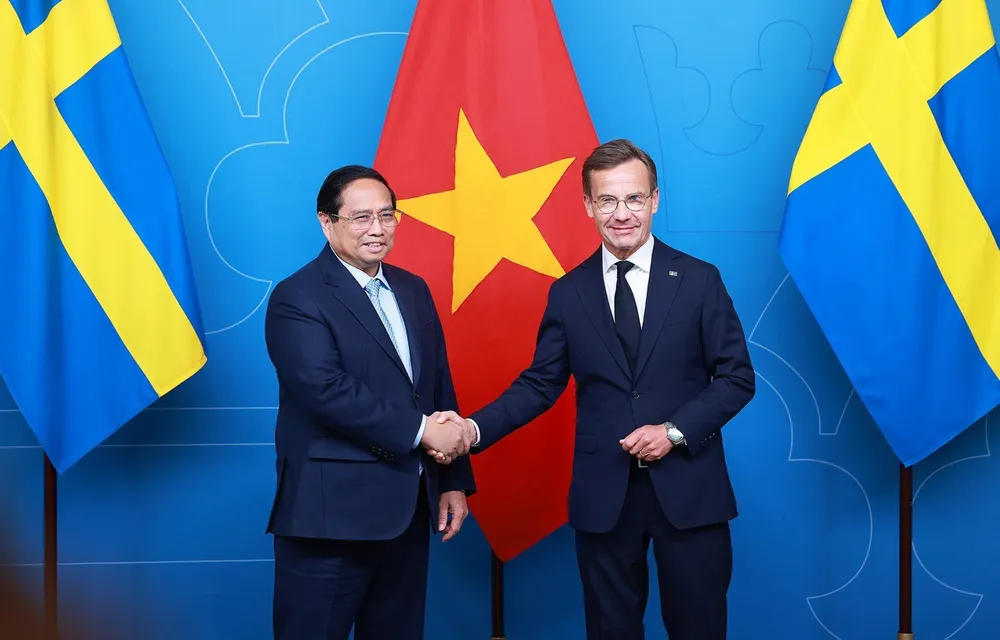 Thủ tướng Thụy Điển Ulf Kristersson và Thủ tướng Phạm Minh Chính. Ảnh: TTXVN N1k.jpg