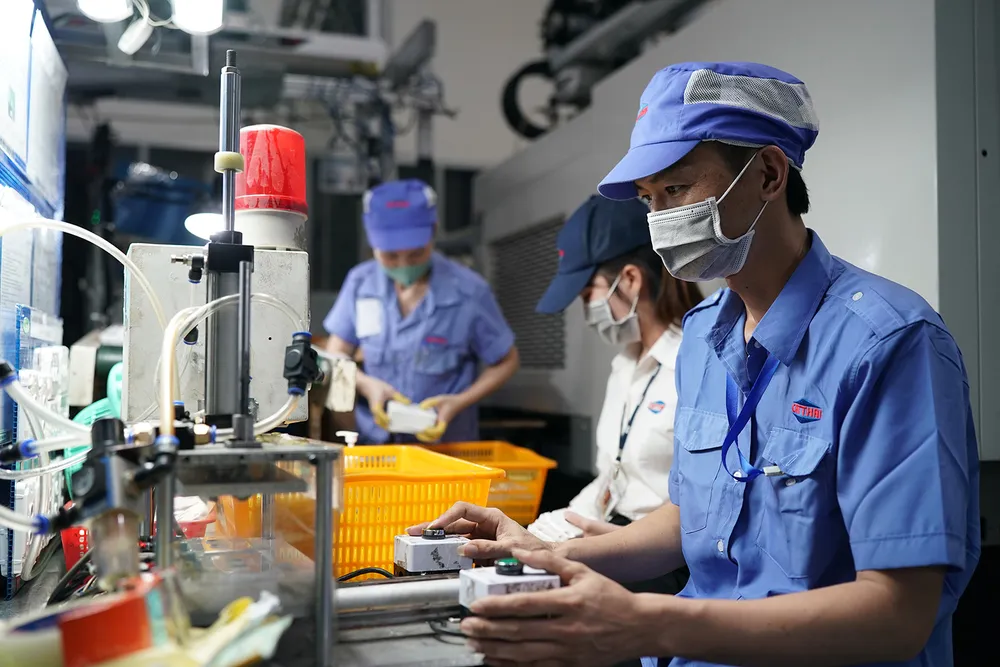 Hoạt động sản xuất tại một doanh nghiệp trong Khu Công nghệ cao TPHCM. Ảnh: Hoàng Hùng O5a.jpg