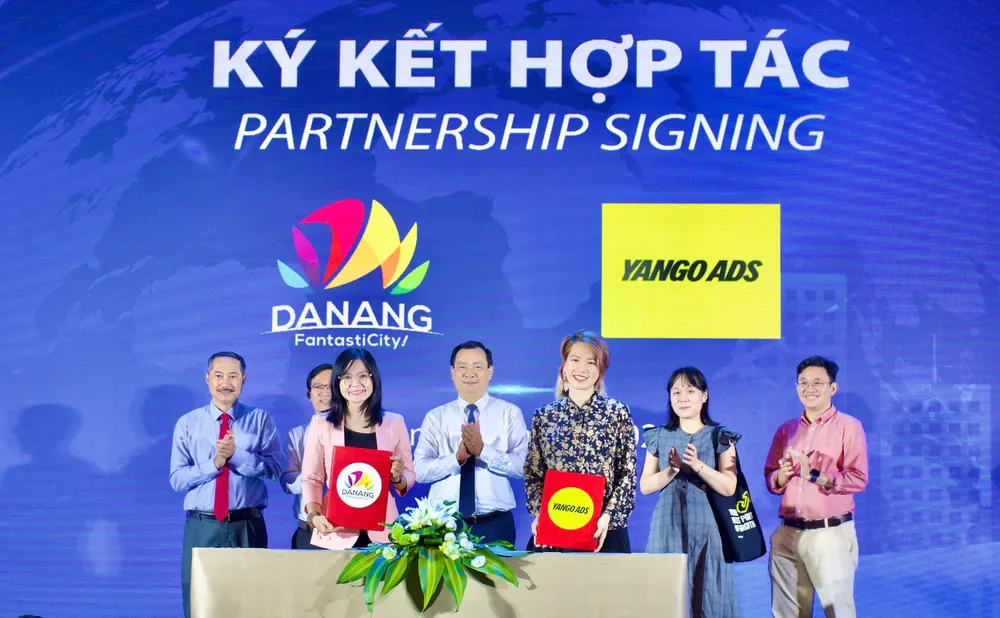 Ký kết hợp tác để phát triển thị trường CIS. Ảnh: XUÂN QUỲNH hinh-anh-7-le-ky-ket-hop-tac-giua-trung-tam-xuc-tien-du-lich-da-nang-va-yango-ads-viet-nam-1-6372-4154.jpg