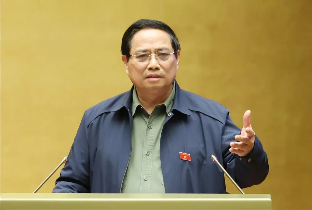 Thủ tướng Chính phủ Phạm Minh Chính phát biểu trước Quốc hội, chiều 30-10. Ảnh: QUANG PHÚC chinh-30-7673-7387.jpeg